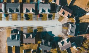 Aerial view of residential homes and property lots in a neighborhood where a mortgage survey may be needed